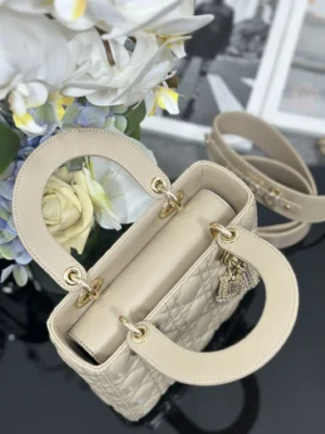 Dior Lady Dior mini bag beige calfskin leather gold hardware charms
