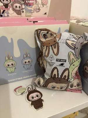 Pop Mart The Monsters blind box collectible toy brown green pastel plastic packaging with stickers