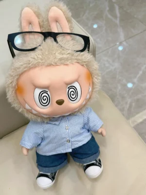 Repsgoat plush doll beige fur blue striped shirt denim pants black white fabric sneakers with black glasses accessory