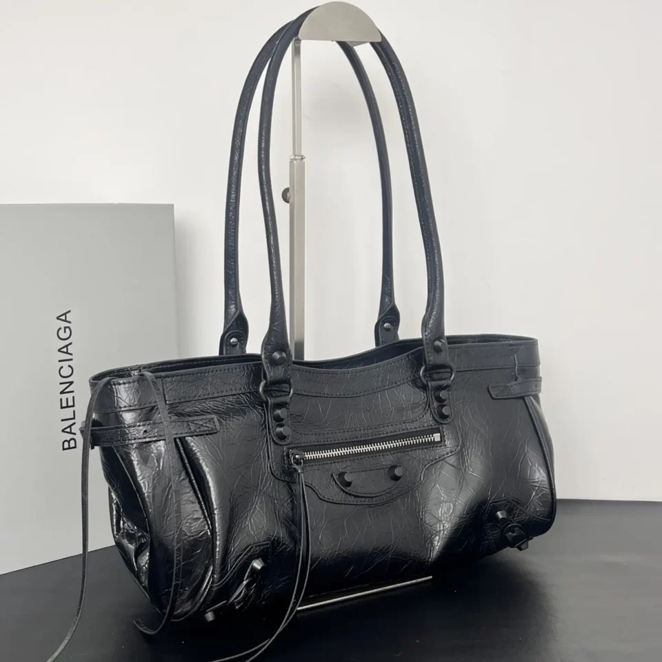 Balenciaga Classic City small black distressed leather tote bag with zipper pocket and tassel details