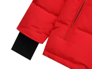 The North Face Intrepid insulated jacket red polyester outerwear with black ribbed cuff detail