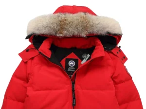 Canada Goose down parka red fabric with fur-trimmed hood and black zipper jacket