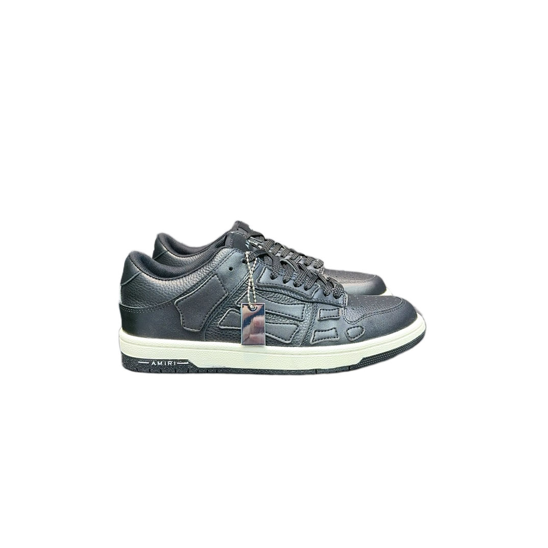 Amiri Skel Top Low black colorway leather sneakers with white sole and metal keychain detail