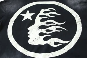 Given image is a close-up of a black and white graphic design on fabric, but it does not provide enough details or brand information to generate the requested specific SEO-optimized alt text including brand, model, color, or material. Please provide an image with a visible product label or more detail about the product for accurate SEO alt text.