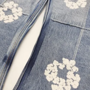 No brand indicated denim jeans light blue color cotton material with white floral embroidery detail