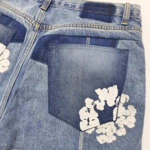 No brand visible denim jeans blue color with white floral embroidery cotton material
