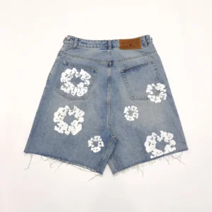 Denim Tears denim shorts blue cotton with white floral prints and frayed hems