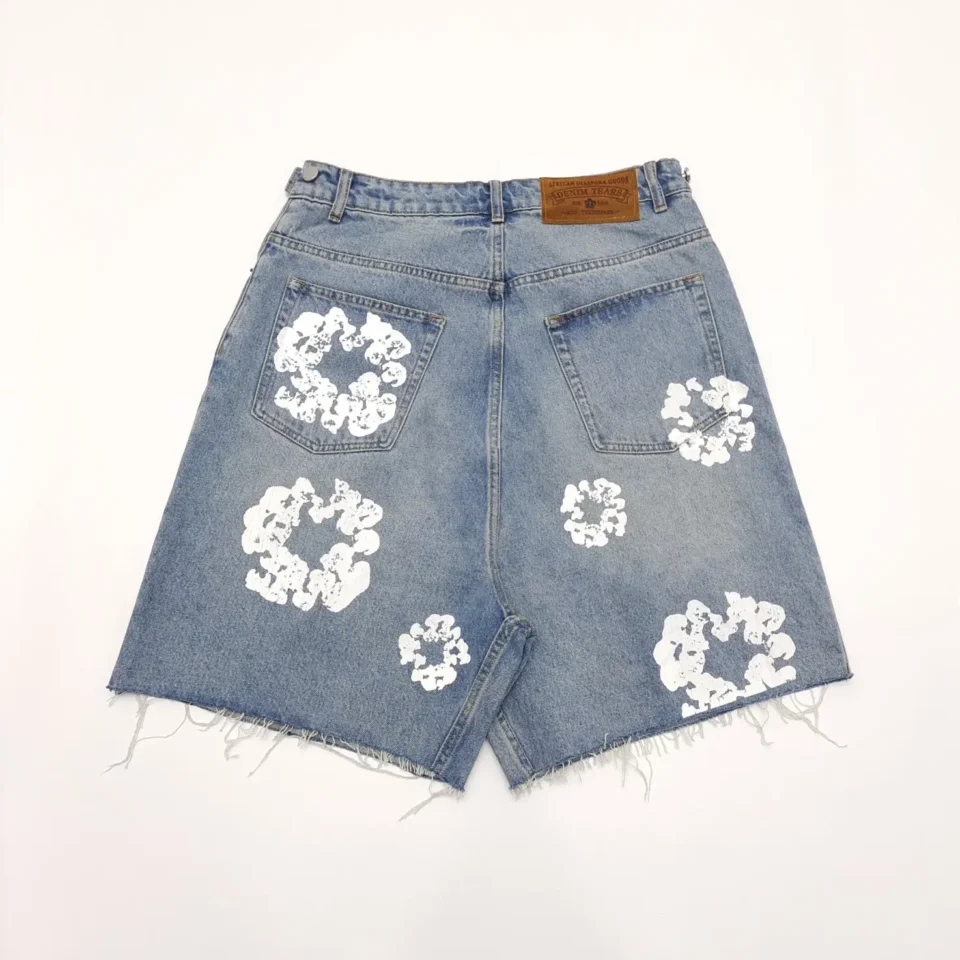 Denim Tears denim shorts blue cotton with white floral prints and frayed hems