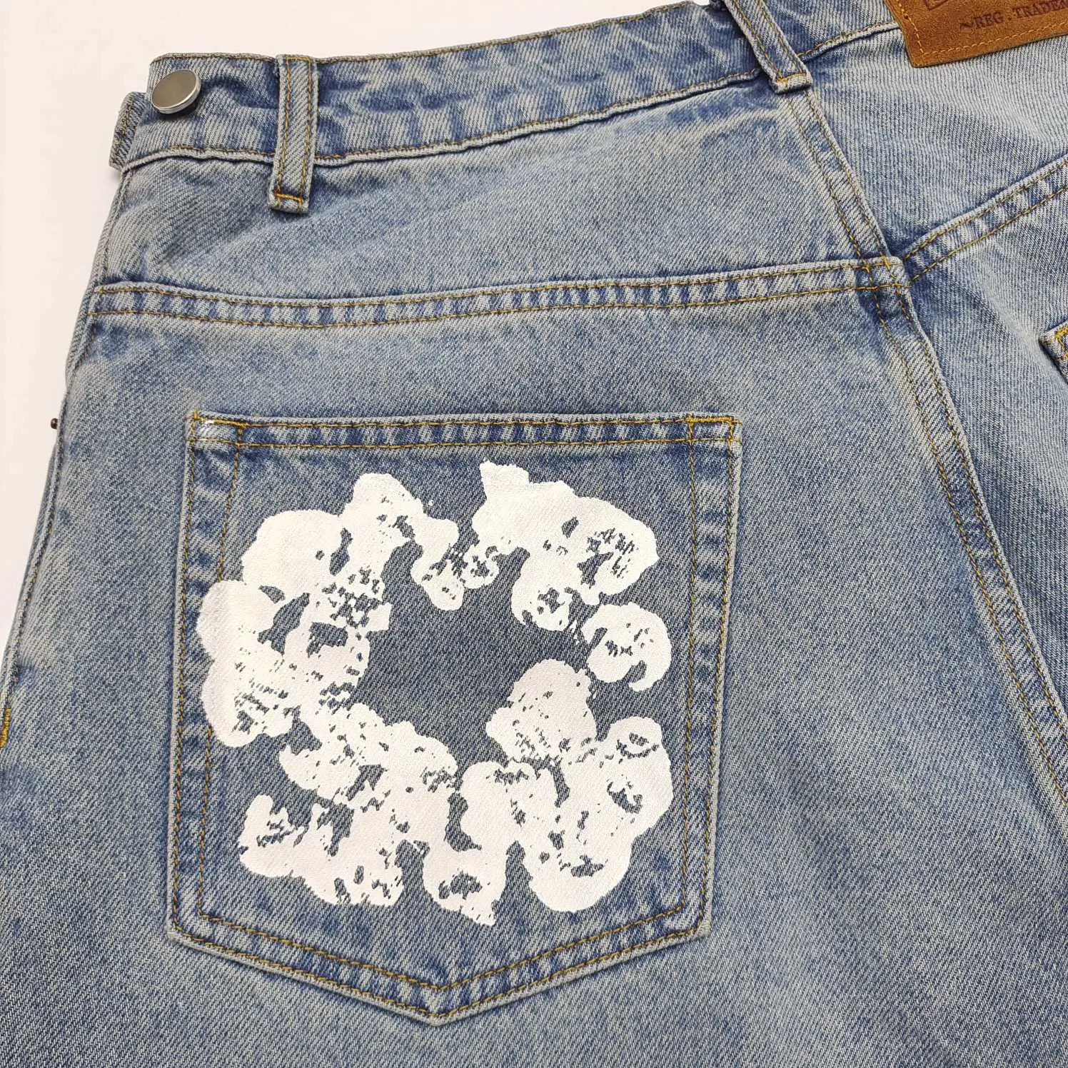 RBG blue denim jeans light wash pocket white paint splatter design cotton material