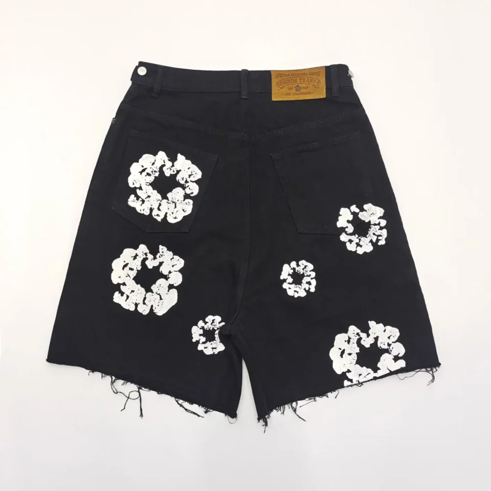 Denim Tears shorts black denim white floral print raw hem cotton material