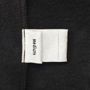 Acne Studios wool fabric black premium material label close-up