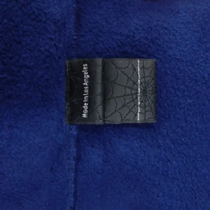 Supreme fleece jacket blue fabric with spider web pattern clothing tag made in Los Angeles