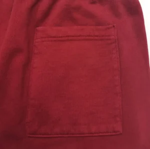 Repsgoat corduroy pocket fabric maroon cotton material close-up detail