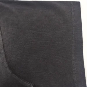 Supreme Black cotton ribbed fabric clothing material close-up with visible stitch detail