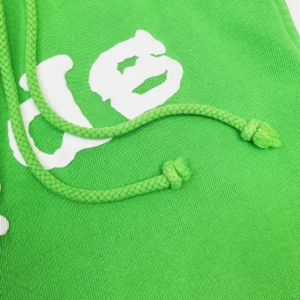 Supreme hoodie green cotton fabric with white logo print and braided drawstrings close-up