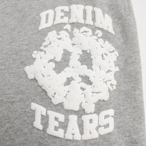 Denim Tears graphic sweatshirt grey cotton blend fabric with white textured skull and lettering design