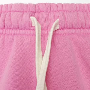 Unknown brand pink sweatpants close-up elastic waistband with white cotton drawstring