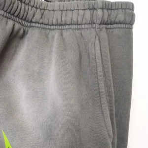 Nike sweatpants style DD1647-067 grey color cotton blend fabric with elastic waistband and side pockets
