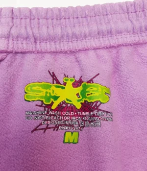 Stüssy fleece shorts purple cotton with elastic waistband and yellow green logo medium size