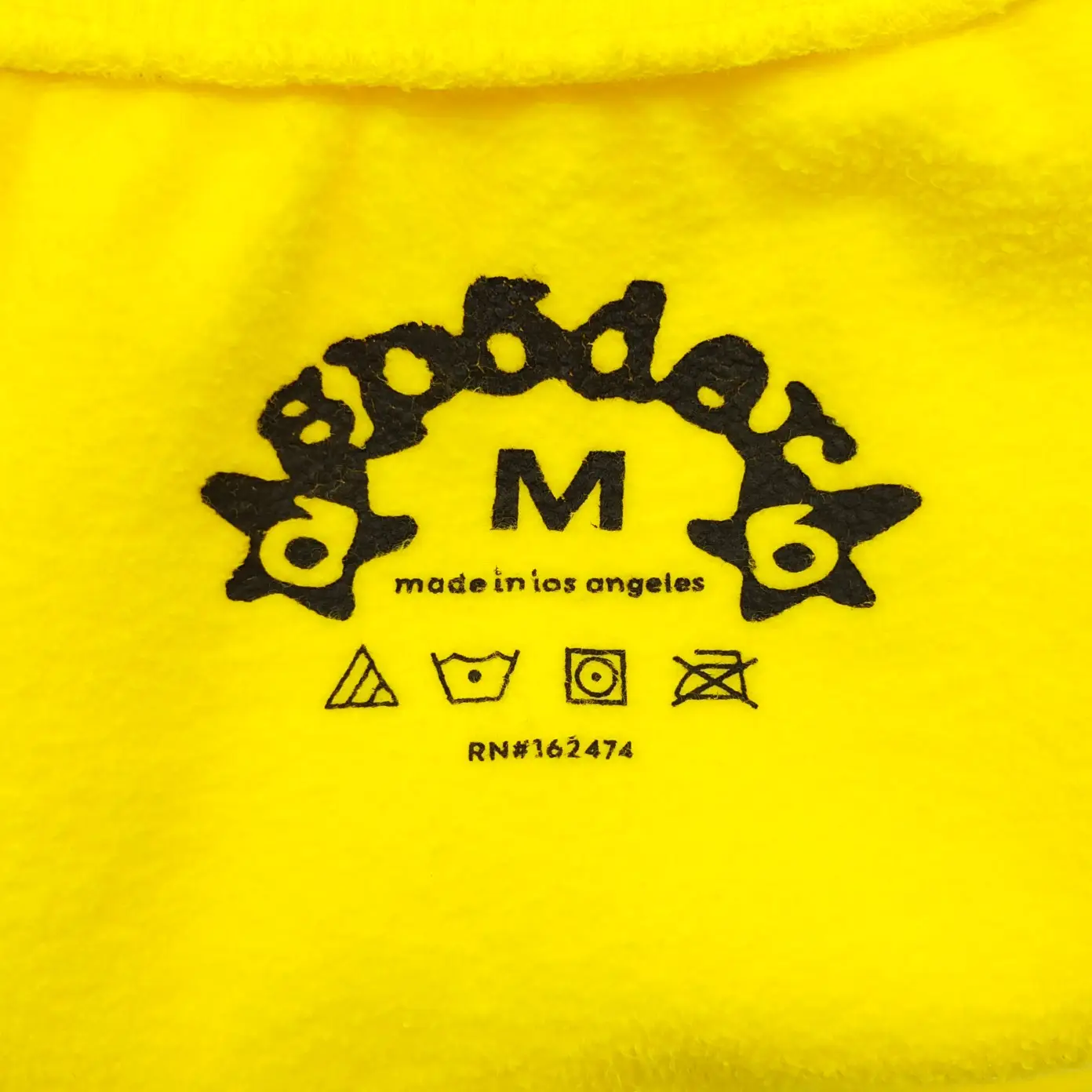 Gooddays fleece sweatshirt medium size yellow fabric made in Los Angeles with care symbols