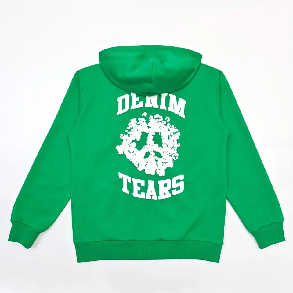 Denim Tears hoodie green cotton fleece with white graphic text and peace sign design on back