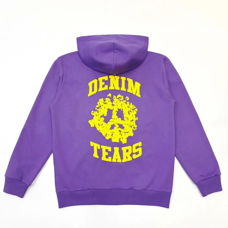 Denim Tears hoodie purple cotton with yellow floral peace sign and block text design on back