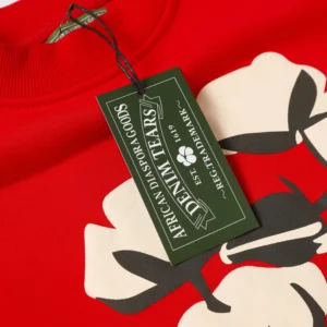 Denim Tears sweatshirt red cotton with black and white floral graphic and green brand tag