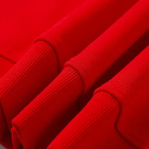 Repsgoat red sweatshirt cotton fabric ribbed cuffs close-up texture detail