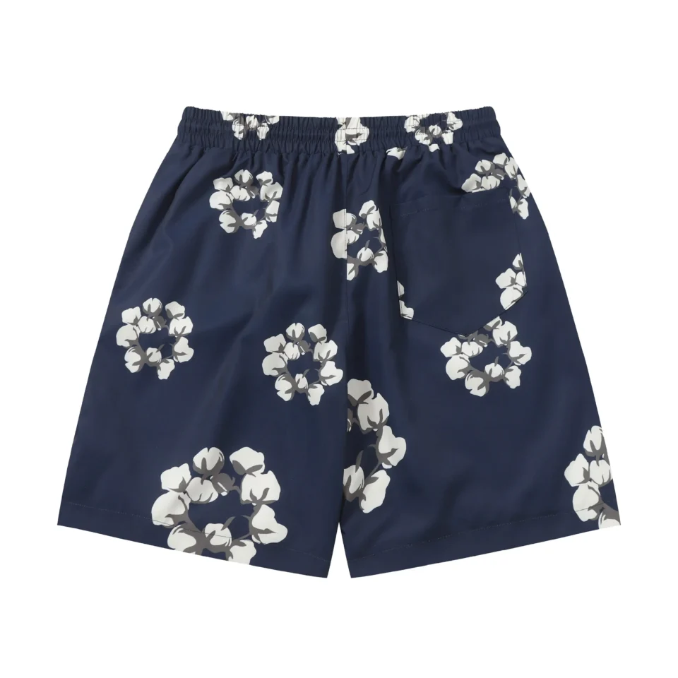 Since the image shows a pair of floral shorts, this does not match any of the categories (Watches, Sneakers, Bags, Accessories) provided for generating the alt text as per your structure. If you want, I can still generate a descriptive alt text for this item or you could provide a category or model details.