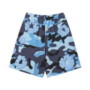 Denim Tears Cotton Flower camo shorts in blue, featuring floral designs, suitable for casual wear, available in sizes S-XL for $59.00.