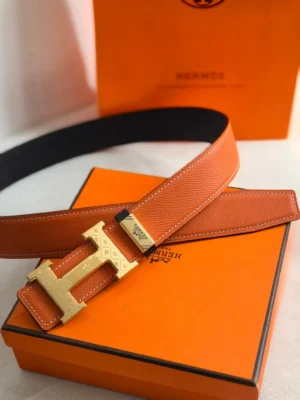 Hermes belt orange leather gold tone H buckle reversible black leather strap accessory