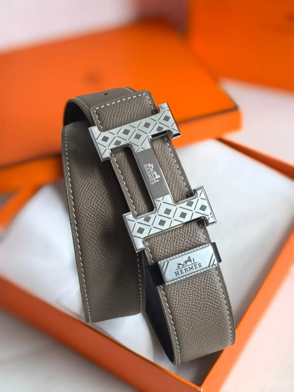 Hermes leather belt taupe silver-tone engraved H buckle luxury accessory with textured finish