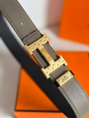 Herm&egrave;s belt taupe leather gold-tone engraved H buckle accessory elegant design