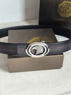 Stefano Ricci 3.8cm luxury leather belt featuring a distinctive silver buckle design, displayed on a neutral background with branded packaging.