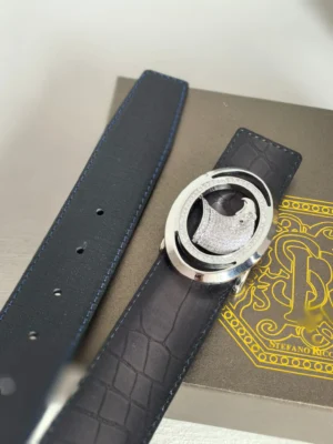 Luxury Stefano Ricci men's leather belt with silver buckle detail on a branded box.