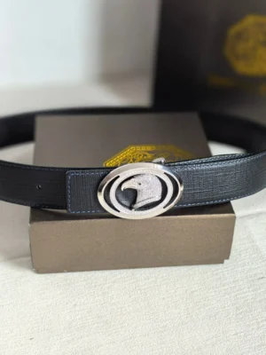 Stefano Ricci 3.8cm luxury leather belt with distinctive silver logo buckle displayed on a neutral background, emphasizing high-end craftsmanship and design.