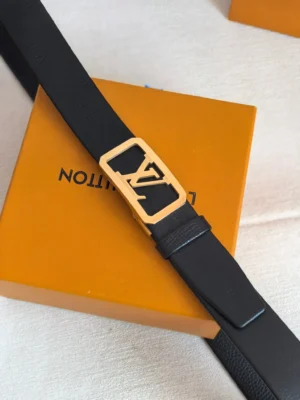 Louis Vuitton men’s automatic buckle leather belt featuring a gold LV logo buckle on a black leather strap, displayed on an orange Louis Vuitton box.