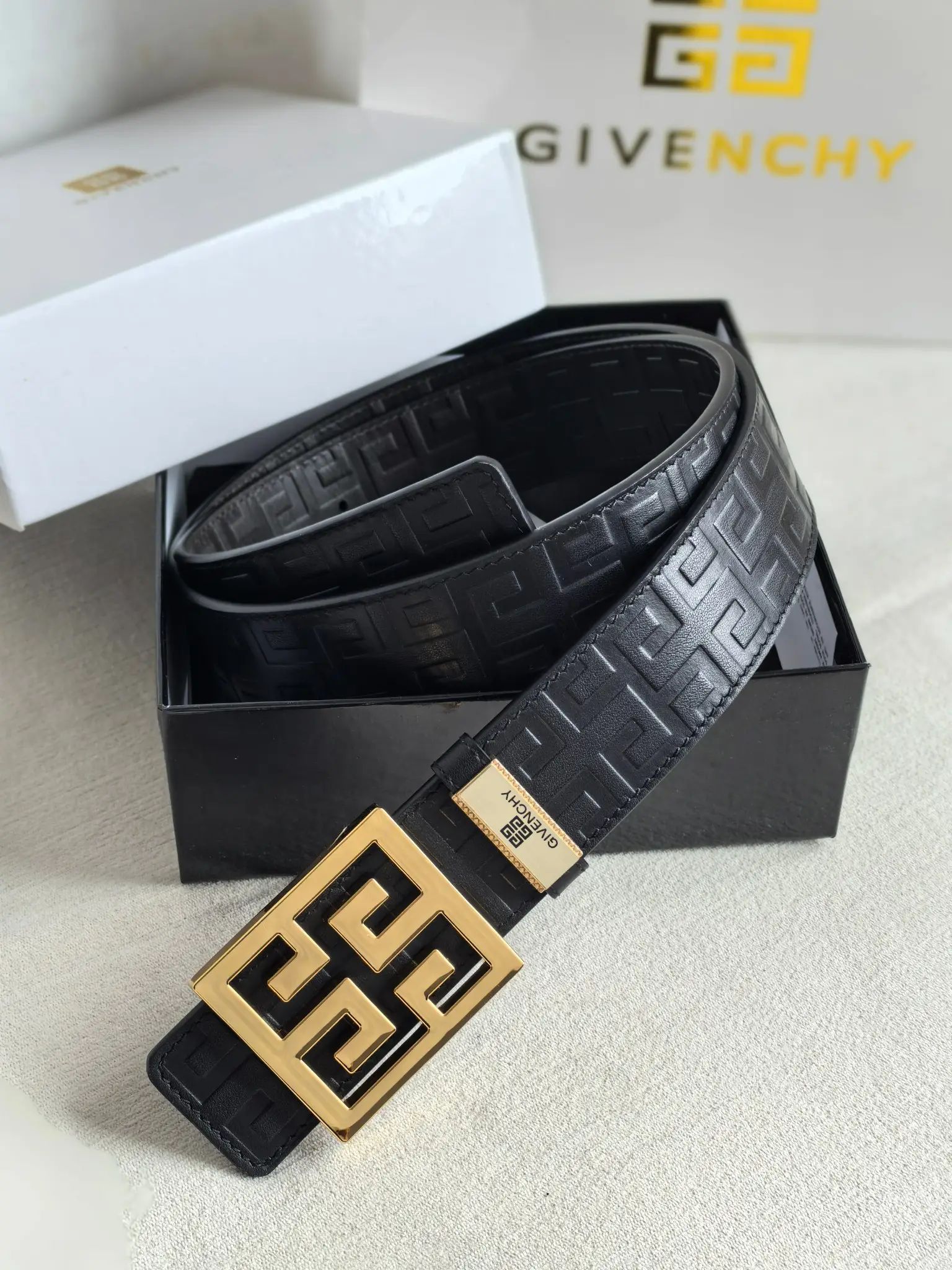 Givenchy belt black leather gold-tone logo buckle with embossed pattern