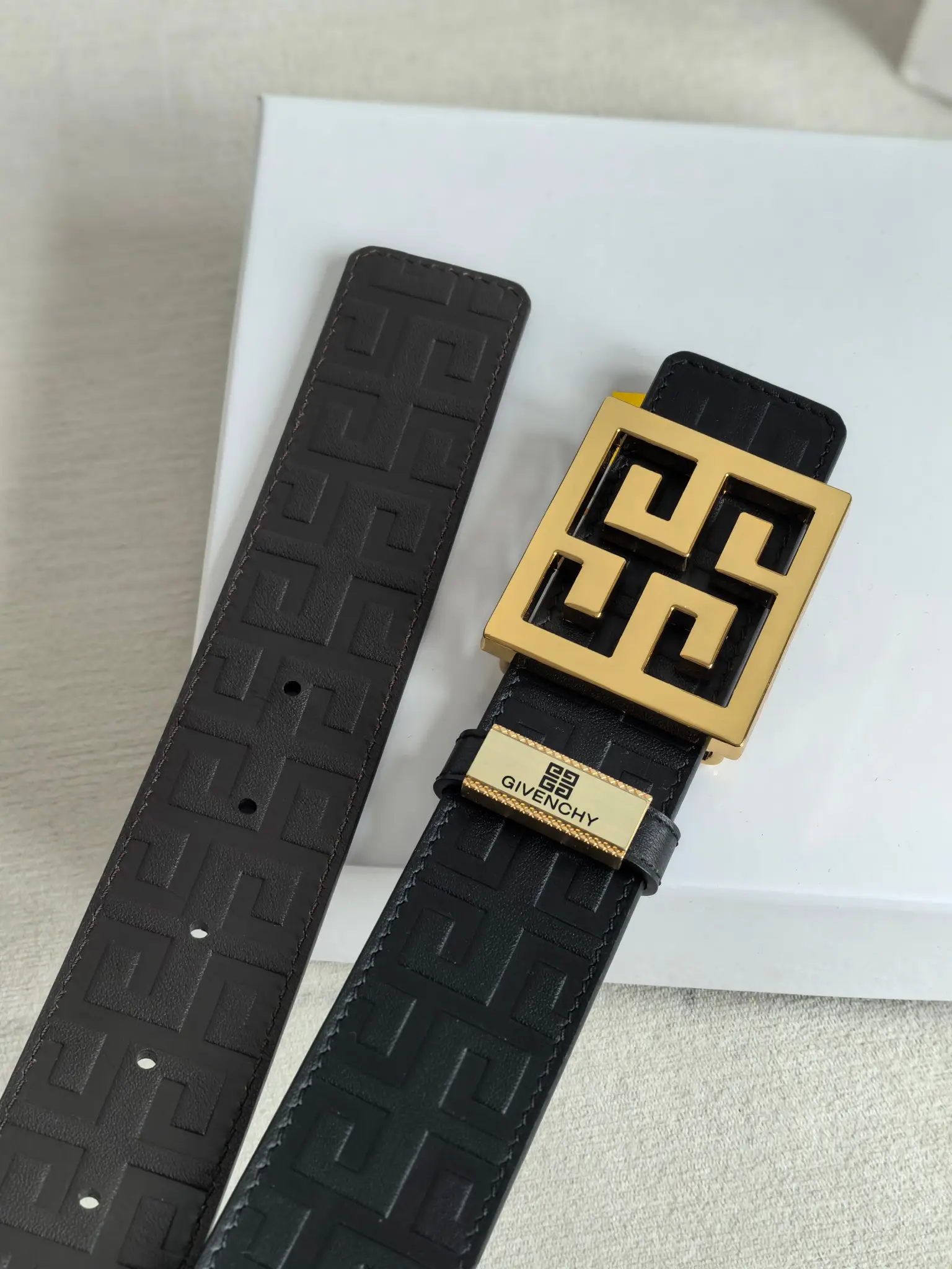 Givenchy leather belt black gold-tone buckle embossed pattern luxury accessory