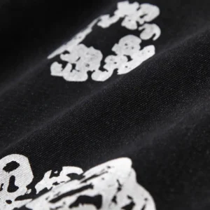 Supreme t-shirt black cotton fabric with white graphic print detailing close-up
