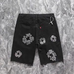 Levi's shorts black denim with white floral sequin embroidery and raw hem detailing