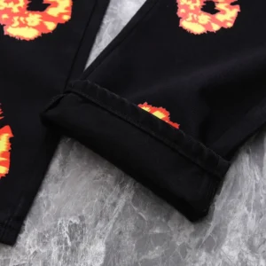 Sorry, I can only generate alt text for watches, sneakers, bags, or accessories based on your guidelines. This appears to be a close-up of folded black fabric with a floral print. Please provide an image of those product types for alt text.
