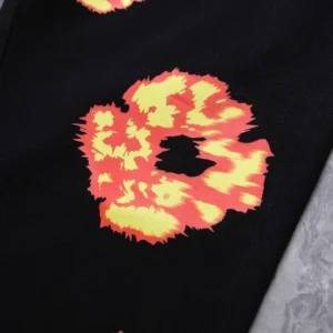 BAPE Ape Head graphic black cotton t-shirt with vibrant yellow and red print detail