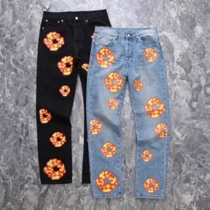 No brand or model information visible for these jeans with red and yellow flame prints on black and light blue denim materials