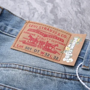 Levi's 501 DT blue denim jeans 32W 32L cotton with original riveted leather patch and floral tag