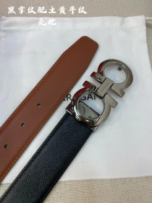 Salvatore Ferragamo belt black textured leather front strap brown leather back strap silver double Gancio buckle