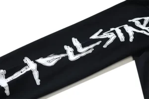 Fear of God Essentials Graphic Print Long Sleeve Shirt black cotton material with white bold text design on sleeve