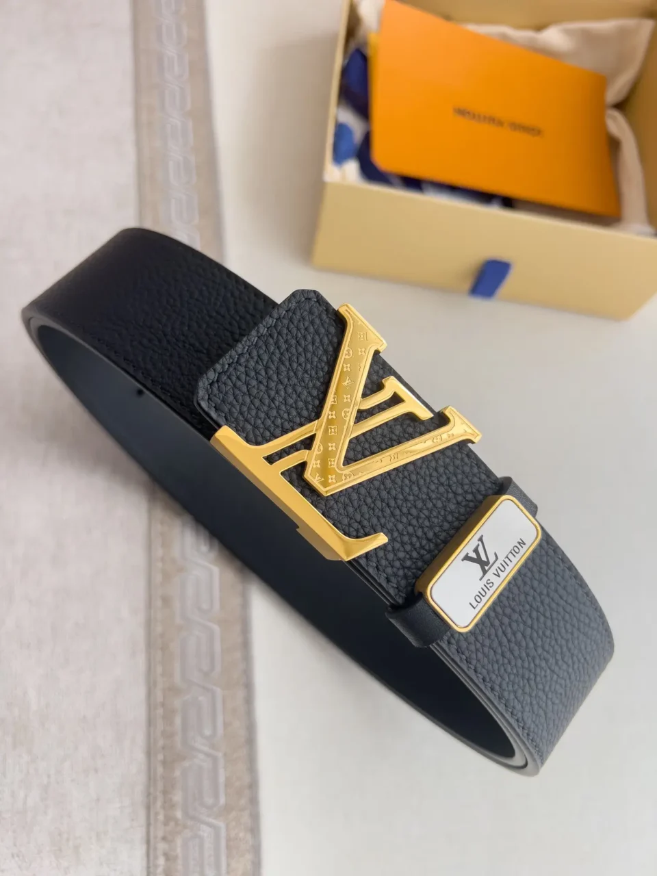 Louis Vuitton initiales 35mm belt black grained leather gold-tone LV buckle