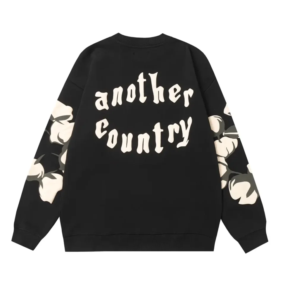 Another Country sweatshirt black floral print cotton pullover with graphic text on back