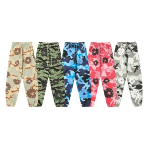 High-quality cotton flower hair sweatpants in various camouflage patterns, including Camo Blue, Camo Grey, Camo Apricot, Camo Green, and pink floral designs, featured for Denim Tears collection.